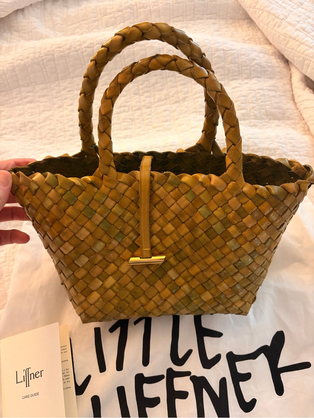 Liffner leather woven mini basket bag in olive green color